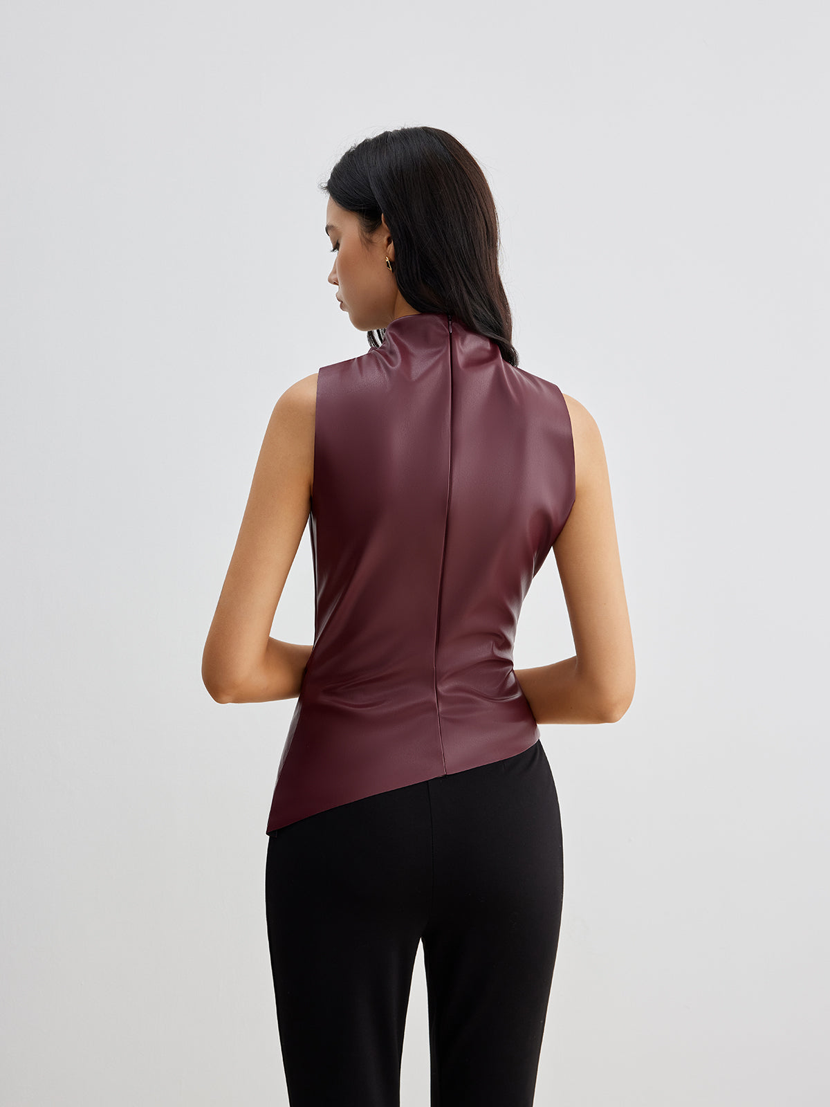 Stylish and Modern Design: Asymmetrical Leather Blouse